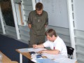 Bjoern beim notwendigen Papierkrieg