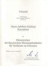 Verleihungsurkunde zum Ehrenzeichen